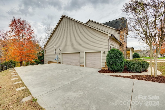 view of home's exterior featuring a garage