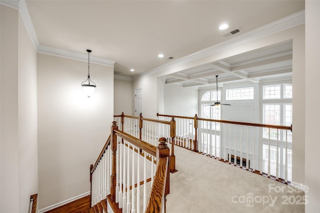 hallway featuring crown molding, coffered ceiling, and beam ceiling