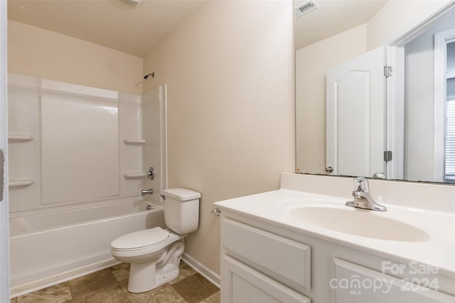 full bathroom with vanity,  shower combination, and toilet