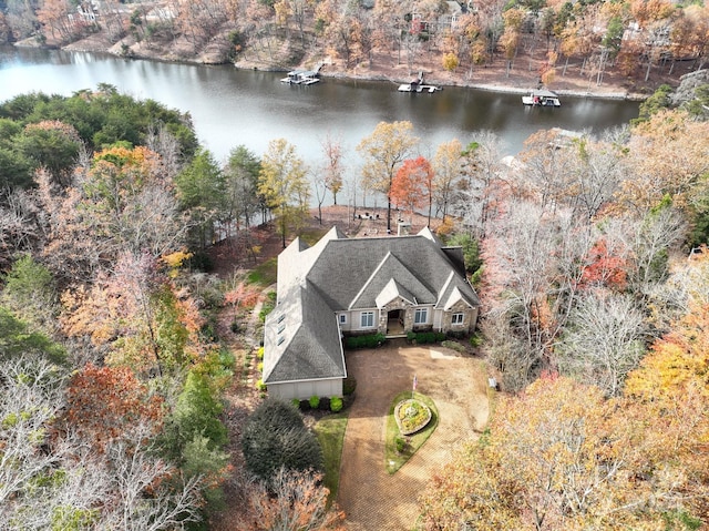 birds eye view of property featuring a water view