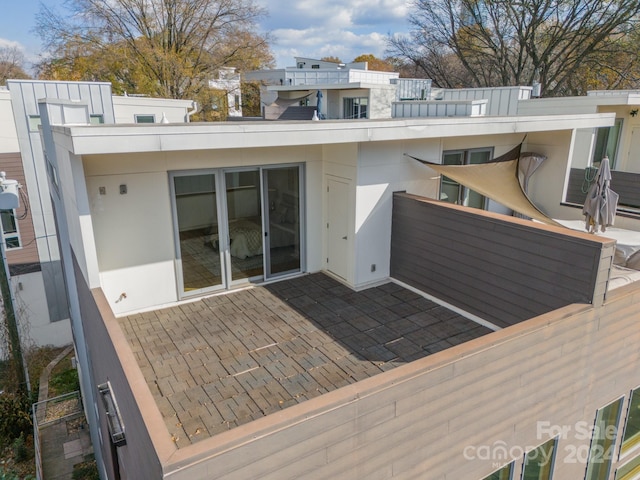 back of house featuring a patio area