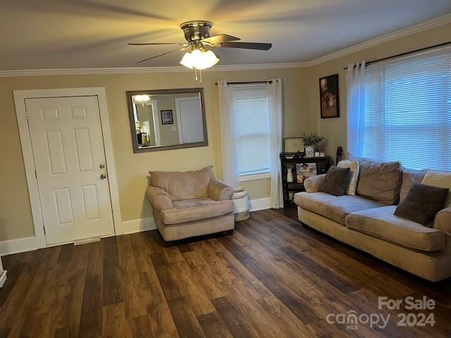 living room featuring ceiling fan, dark hardwood / wood-style flooring, and crown molding