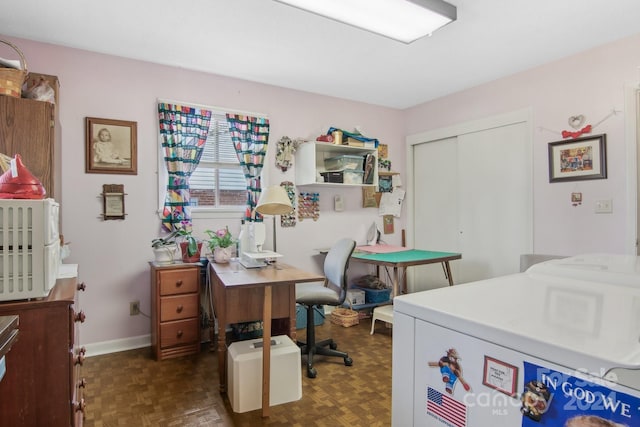 home office featuring dark parquet flooring