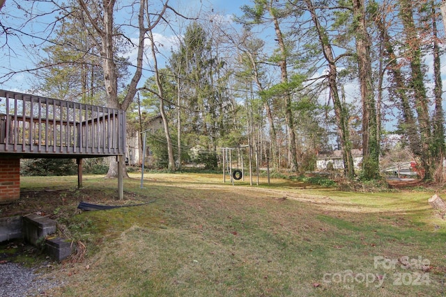 view of yard featuring a deck