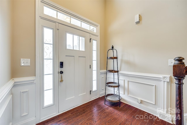 entryway with dark wood-type flooring