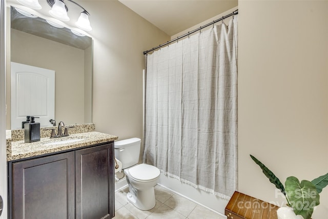 full bathroom featuring tile patterned flooring, vanity, shower / tub combo with curtain, and toilet