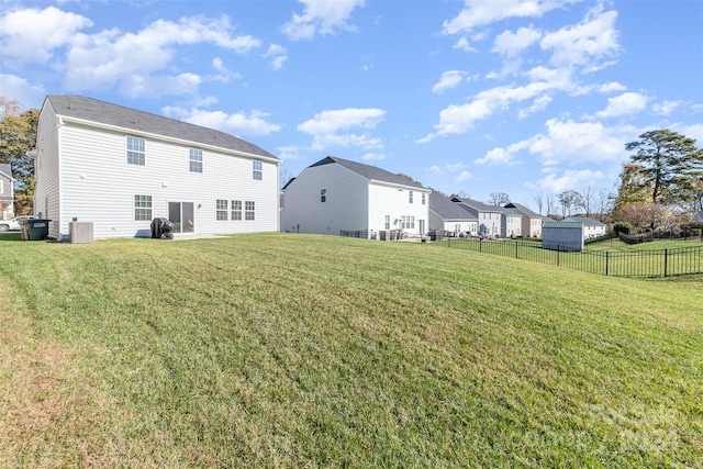 view of yard with central AC unit