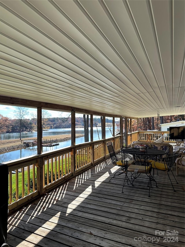 deck featuring a water view