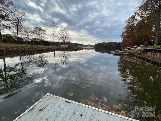 dock area featuring a water view