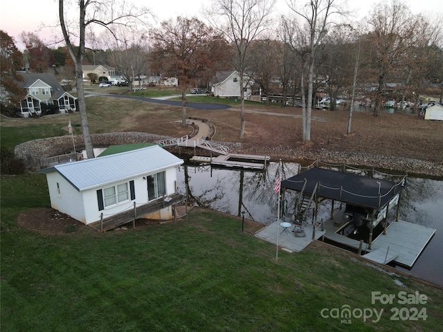 dock area with a lawn