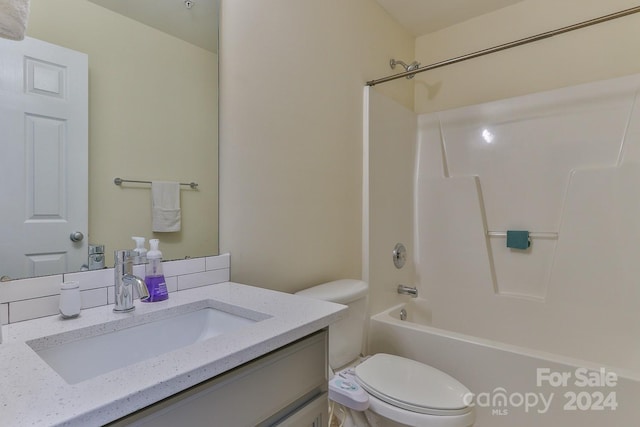 full bathroom featuring vanity, toilet, and shower / washtub combination