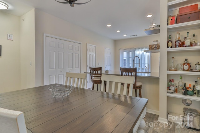 dining area featuring wood-type flooring