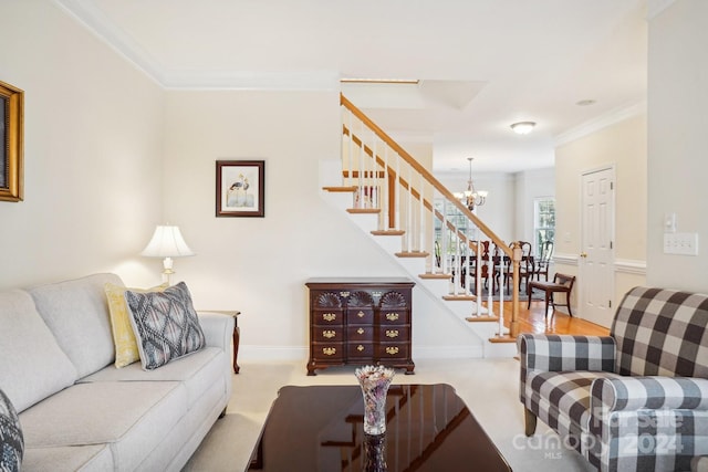 carpeted living room featuring a chandelier and ornamental molding