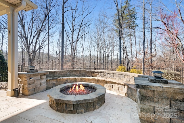 view of patio featuring a fire pit