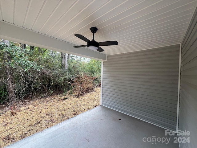 view of patio featuring ceiling fan