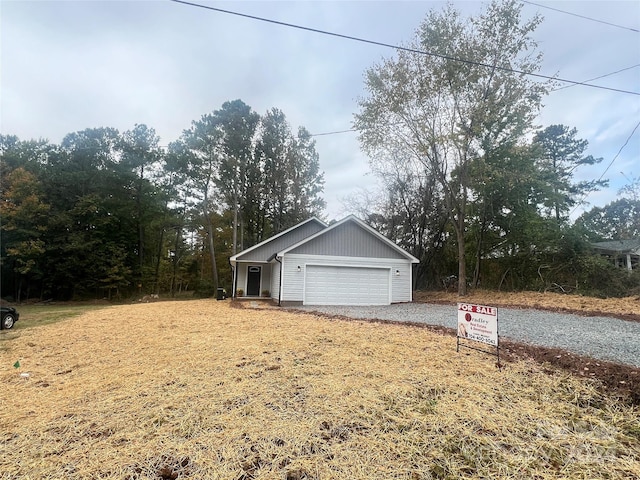 view of property exterior with a garage