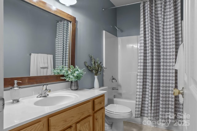 full bathroom with tile patterned floors, vanity, toilet, and shower / bath combo with shower curtain