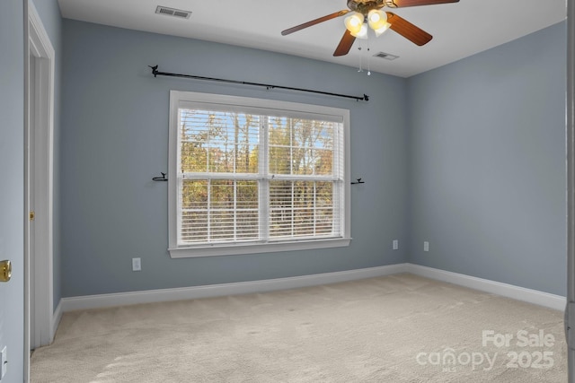 empty room featuring carpet and ceiling fan