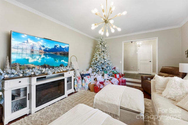 living area with ornamental molding, a notable chandelier, a fireplace, and baseboards