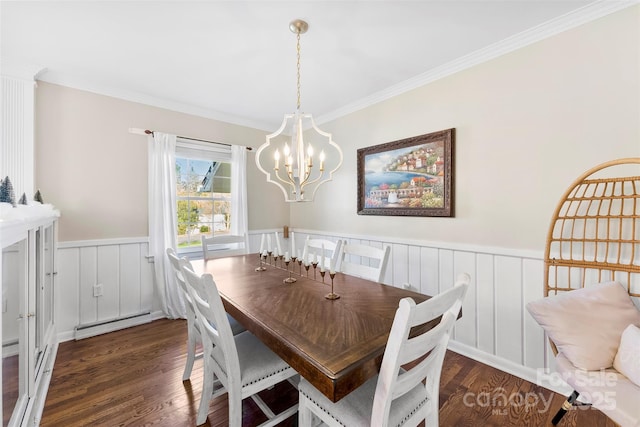 dining area with a wainscoted wall, a notable chandelier, a baseboard radiator, dark wood-type flooring, and ornamental molding