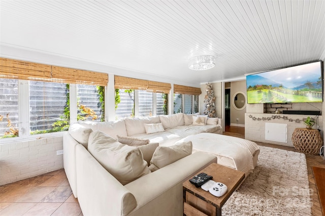 living area with light tile patterned floors