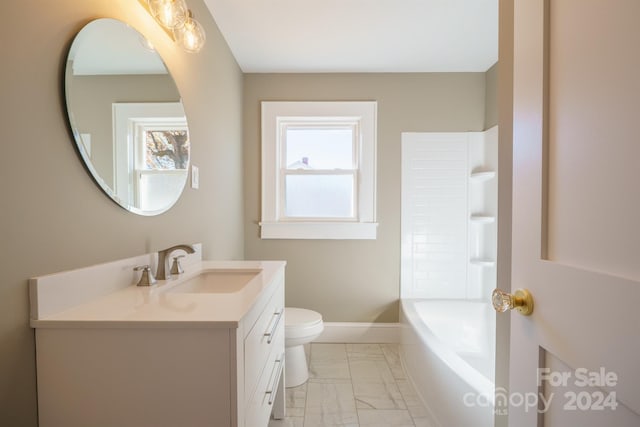 full bathroom with shower / washtub combination, vanity, and toilet