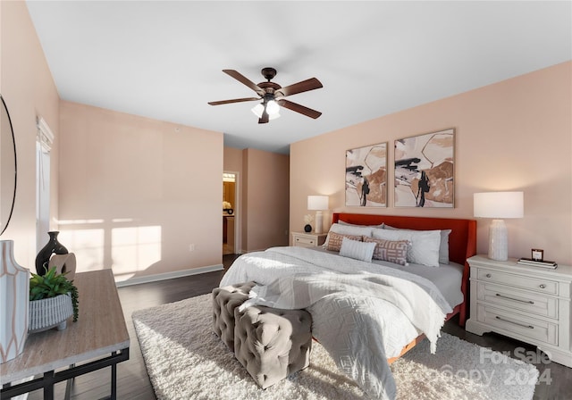 bedroom featuring dark hardwood / wood-style floors and ceiling fan