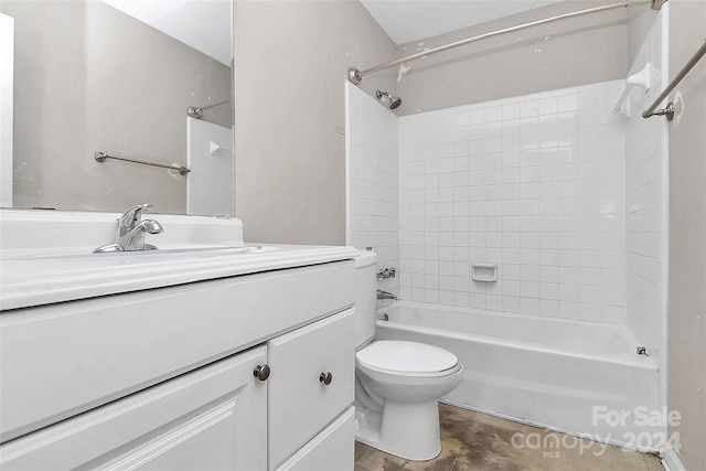 full bathroom featuring vanity, toilet, and tiled shower / bath combo