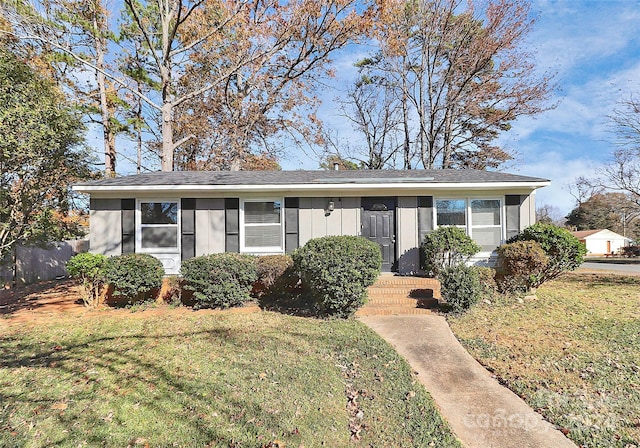 view of front of home with a front yard