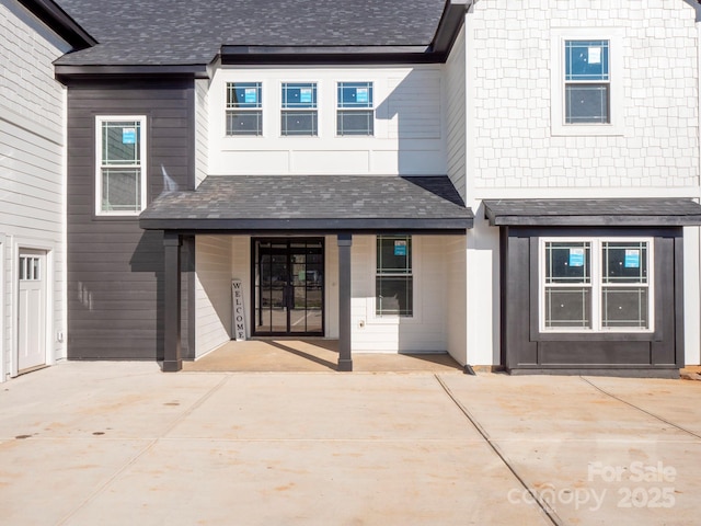 entrance to property with a patio area