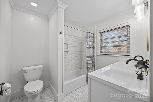 full bathroom featuring tile patterned flooring, vanity, ornamental molding, shower / bath combination with curtain, and toilet