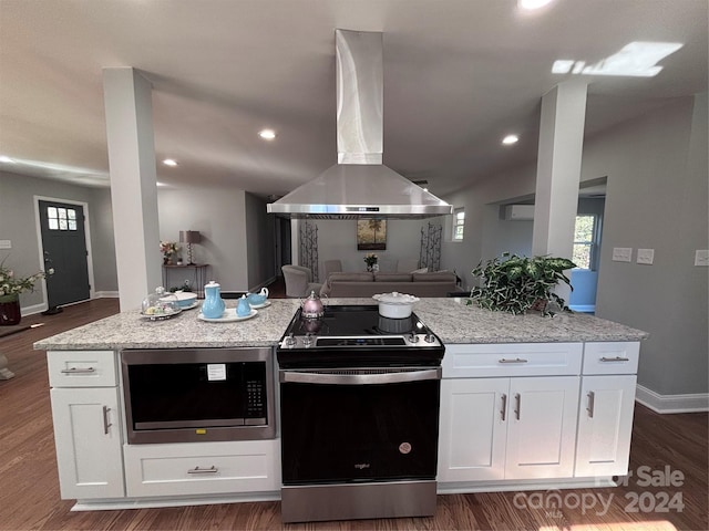 kitchen featuring island exhaust hood, appliances with stainless steel finishes, dark hardwood / wood-style flooring, and white cabinetry