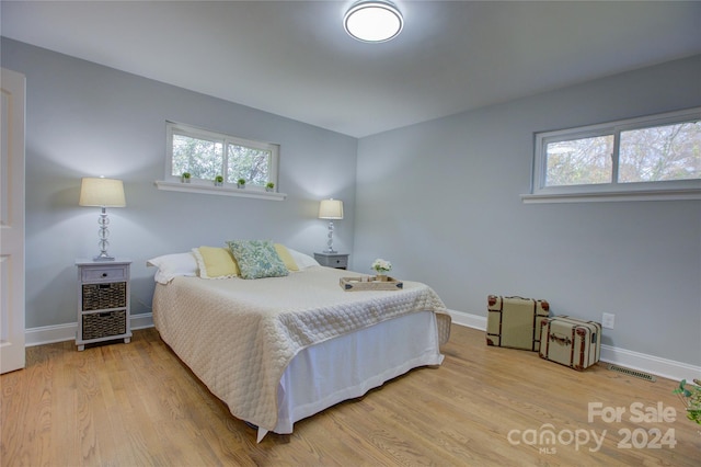 bedroom featuring hardwood / wood-style floors