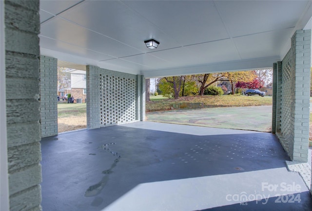 view of patio / terrace featuring a carport