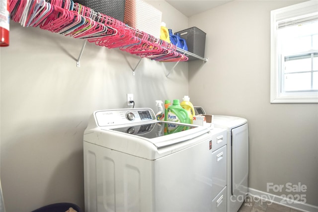 laundry room featuring washer and clothes dryer