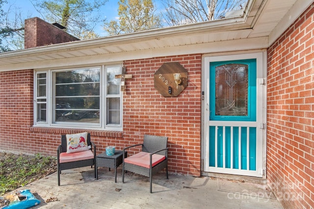 property entrance with a patio