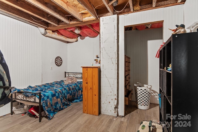 bedroom featuring wood-type flooring