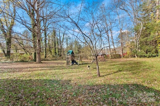 view of yard with a playground