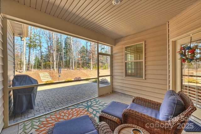 sunroom with wood ceiling