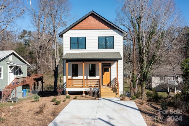 view of property featuring a porch