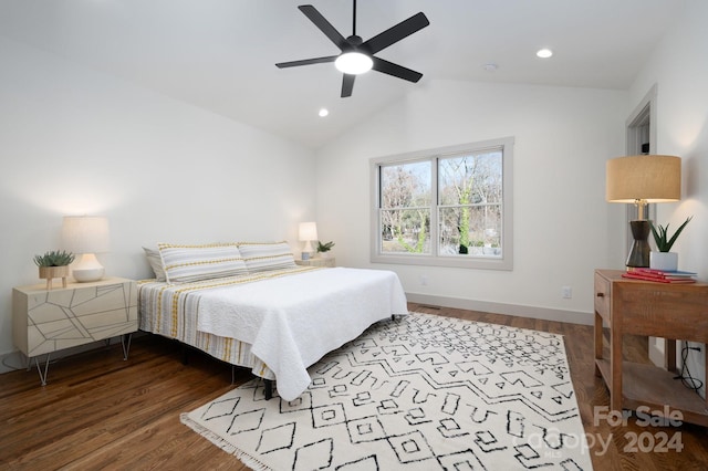 bedroom featuring ceiling fan, lofted ceiling, and hardwood / wood-style flooring