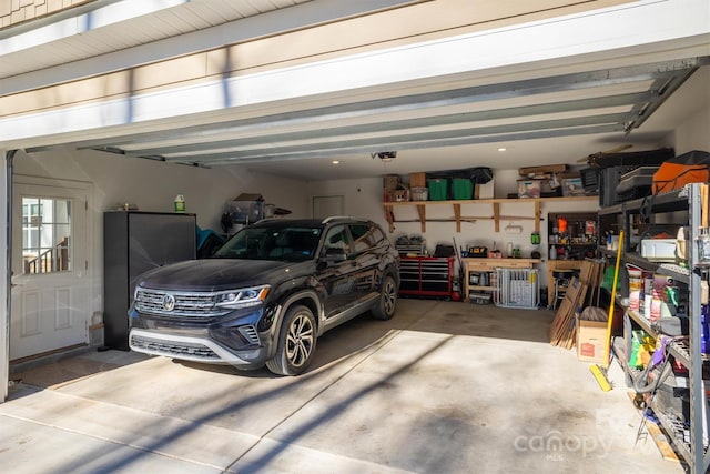 garage featuring a workshop area