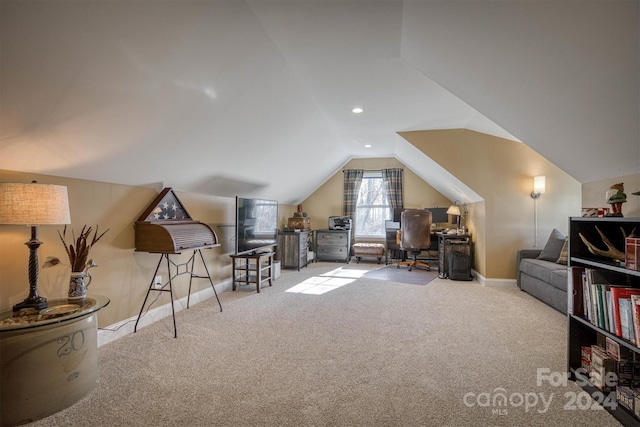 interior space with light colored carpet and lofted ceiling