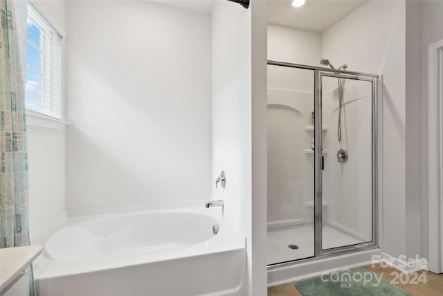 bathroom with plus walk in shower