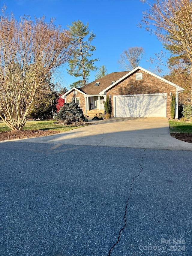 view of front of home with a garage