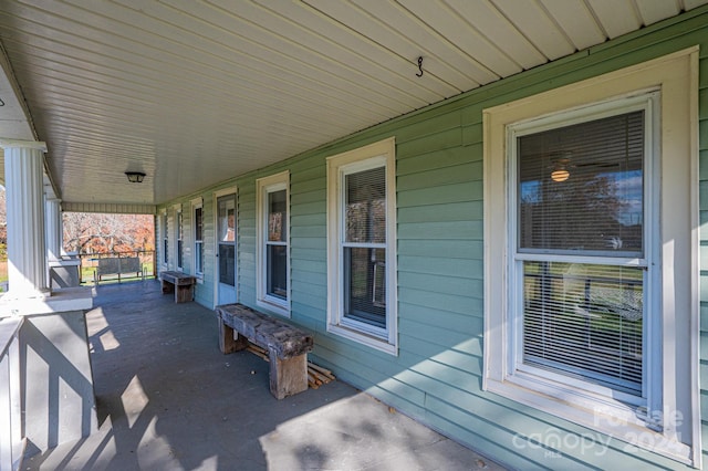 view of patio featuring a porch