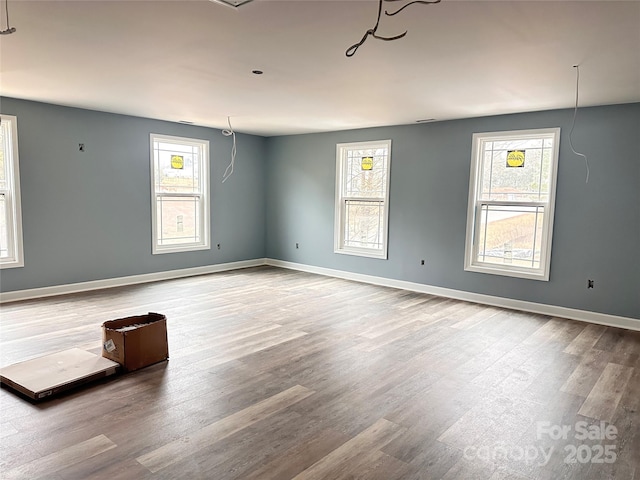 spare room featuring hardwood / wood-style flooring