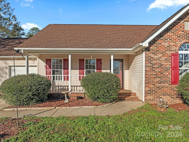 bungalow featuring covered porch