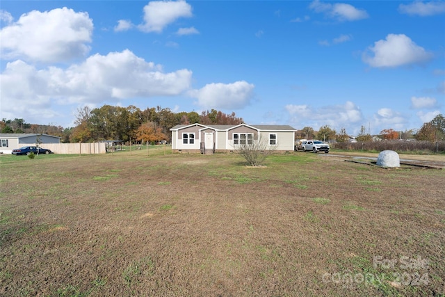 exterior space featuring a front lawn