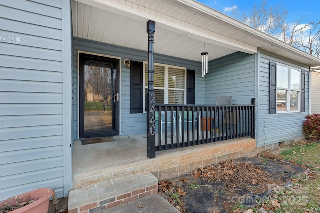 property entrance with a porch